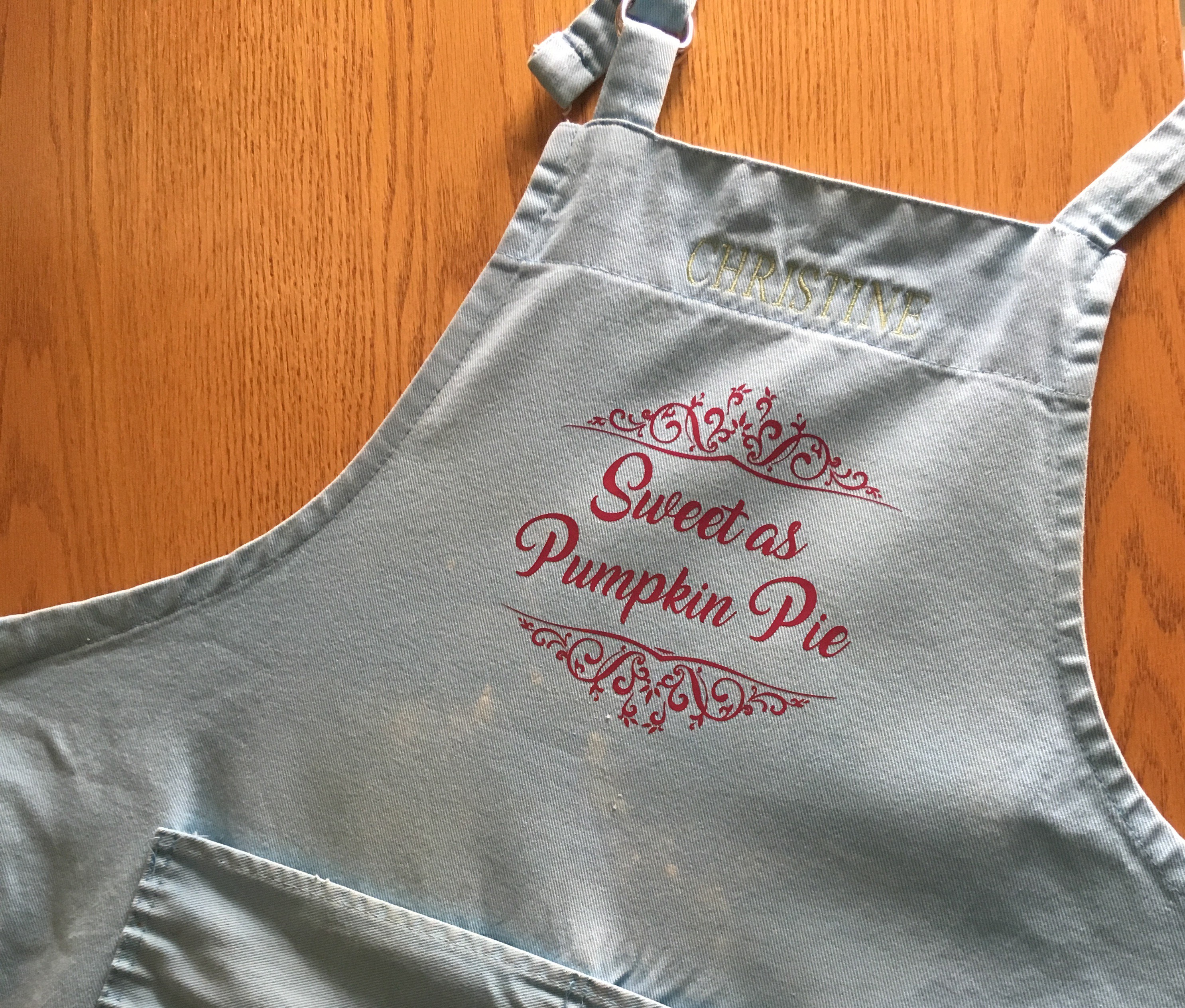 Apron with deccoration that reads "Sweet as Pumpkin Pie"