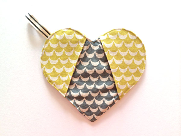 Yellow and grey heart-shaped potholder