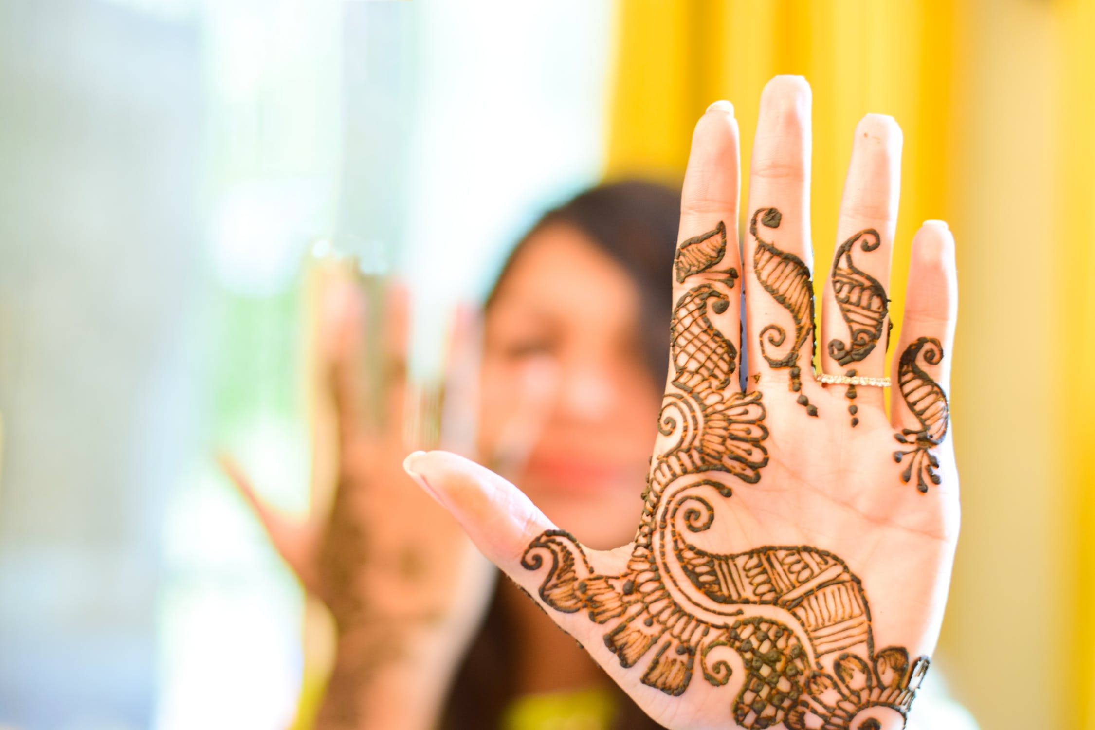 hand with henna tattoo