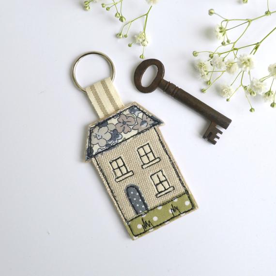 house keychain and key 