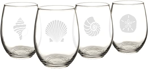 four drinking glasses etched with seashell motif