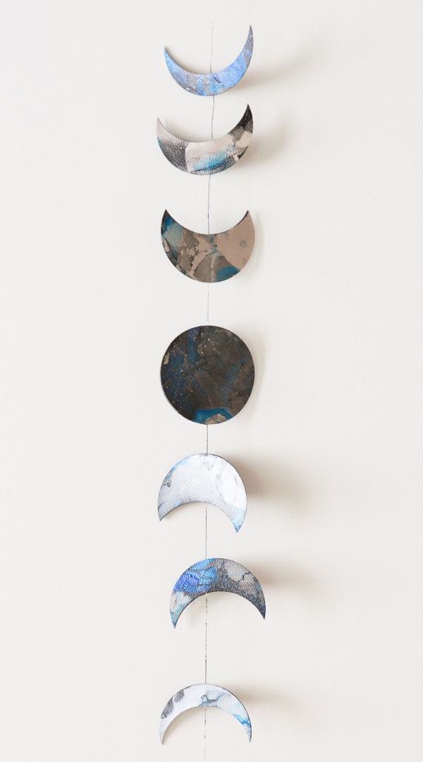 wall hanging with lunar eclipse shapes