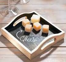 tray with chalkboard surface and blocks of cheese
