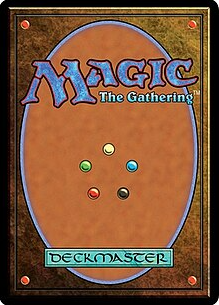 The back of a Magic: The Gathering card. It has a blue oval against a brown background with the words Magic: The Gathering and the word Deckmaster at the bottom of the card back. In the middle there are five colored dots of red, green, black, blue, and yellow. 
